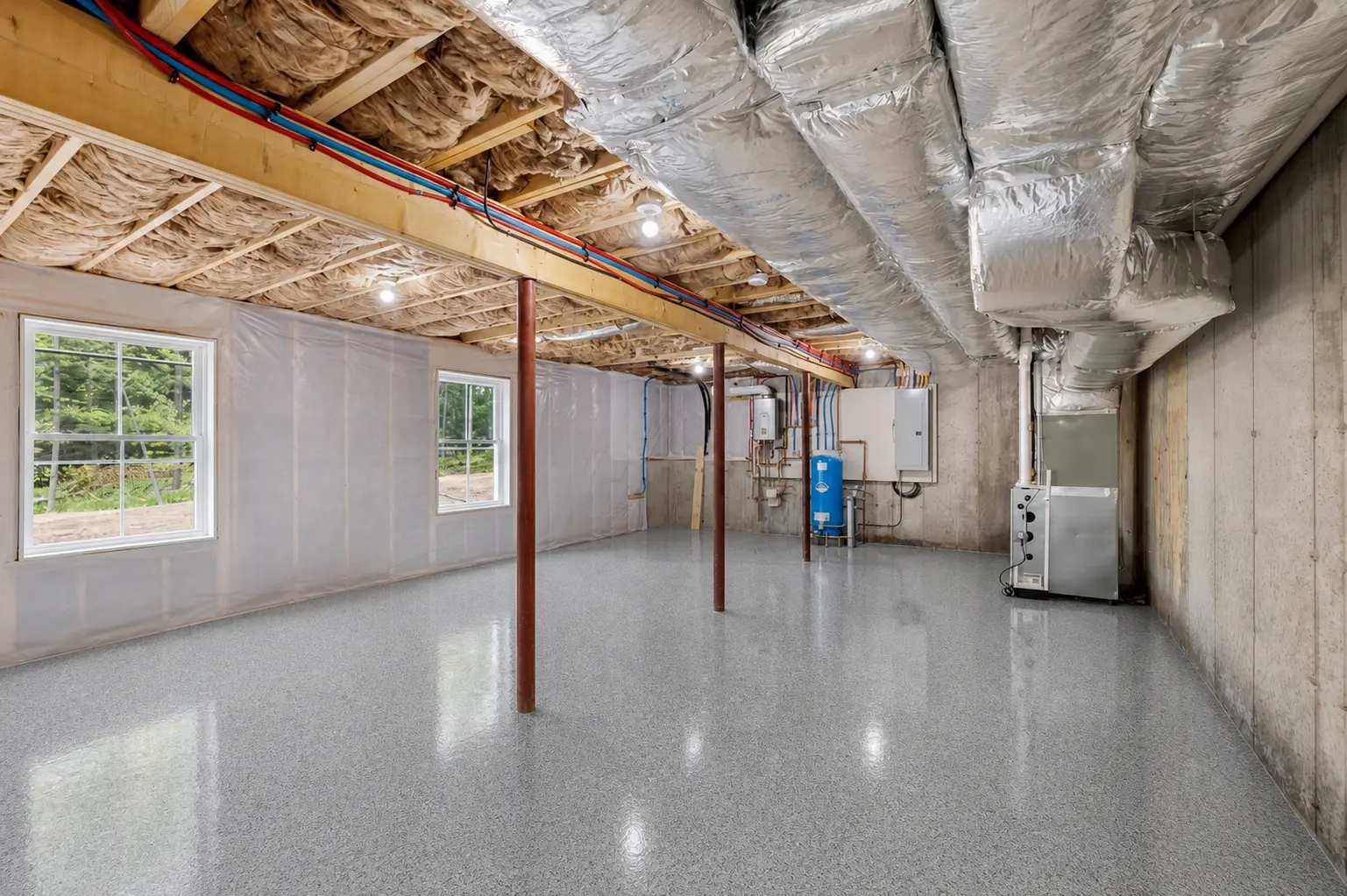 Basement epoxy floor Vancouver — grey flake broadcast system in residential basement