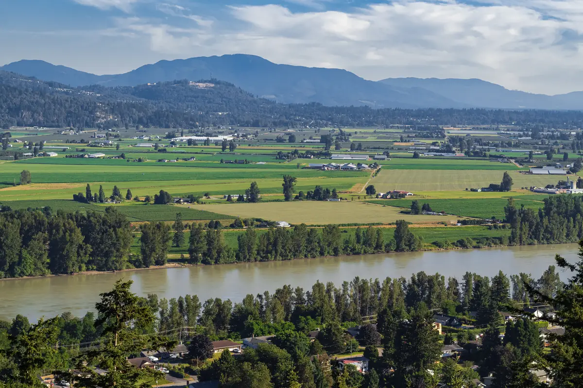 Farmland and the Fraser River in the Fraser Valley near Abbotsford, BC