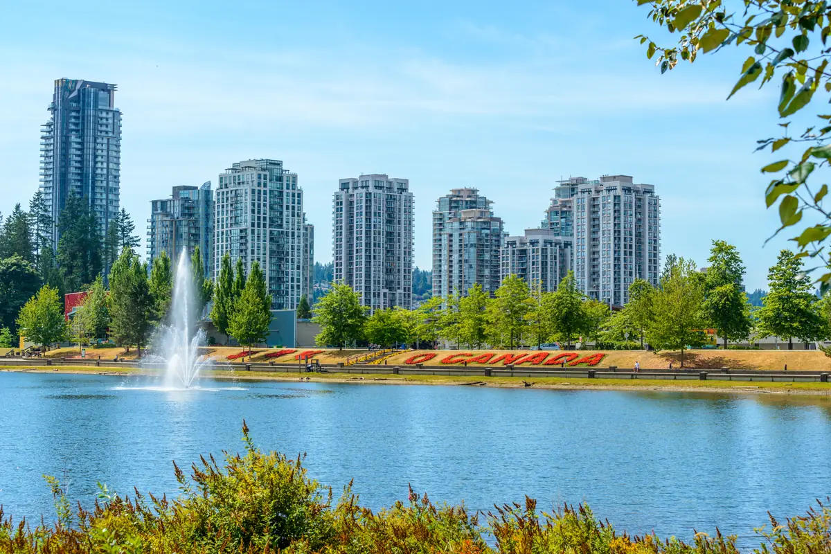 Lafarge Lake and the Coquitlam Town Centre towers in Coquitlam, BC