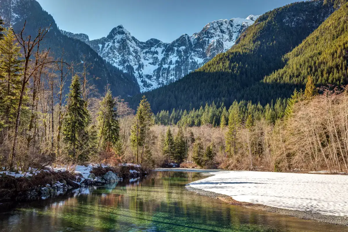 Gold Creek and the snow-capped peaks of Golden Ears Provincial Park near Maple Ridge, BC