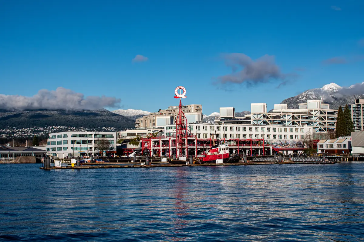 Lonsdale Quay and the North Shore mountains from the water in North Vancouver, BC