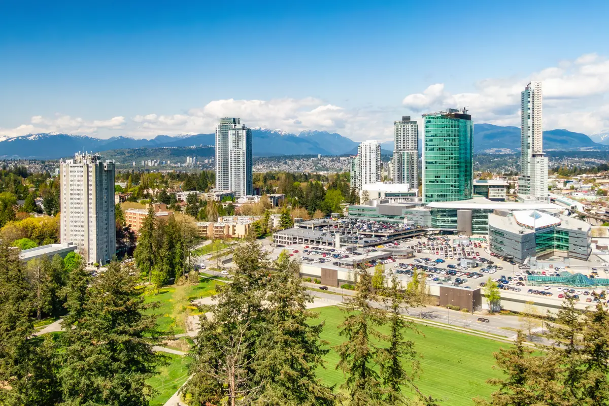 Surrey Central towers and City Centre in Surrey, BC, with the North Shore mountains behind