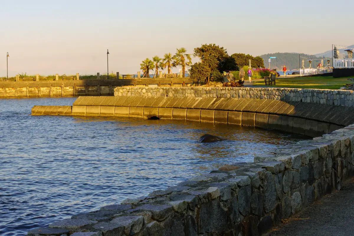 The seawall and pier at Dundarave on an early summer morning in West Vancouver, BC