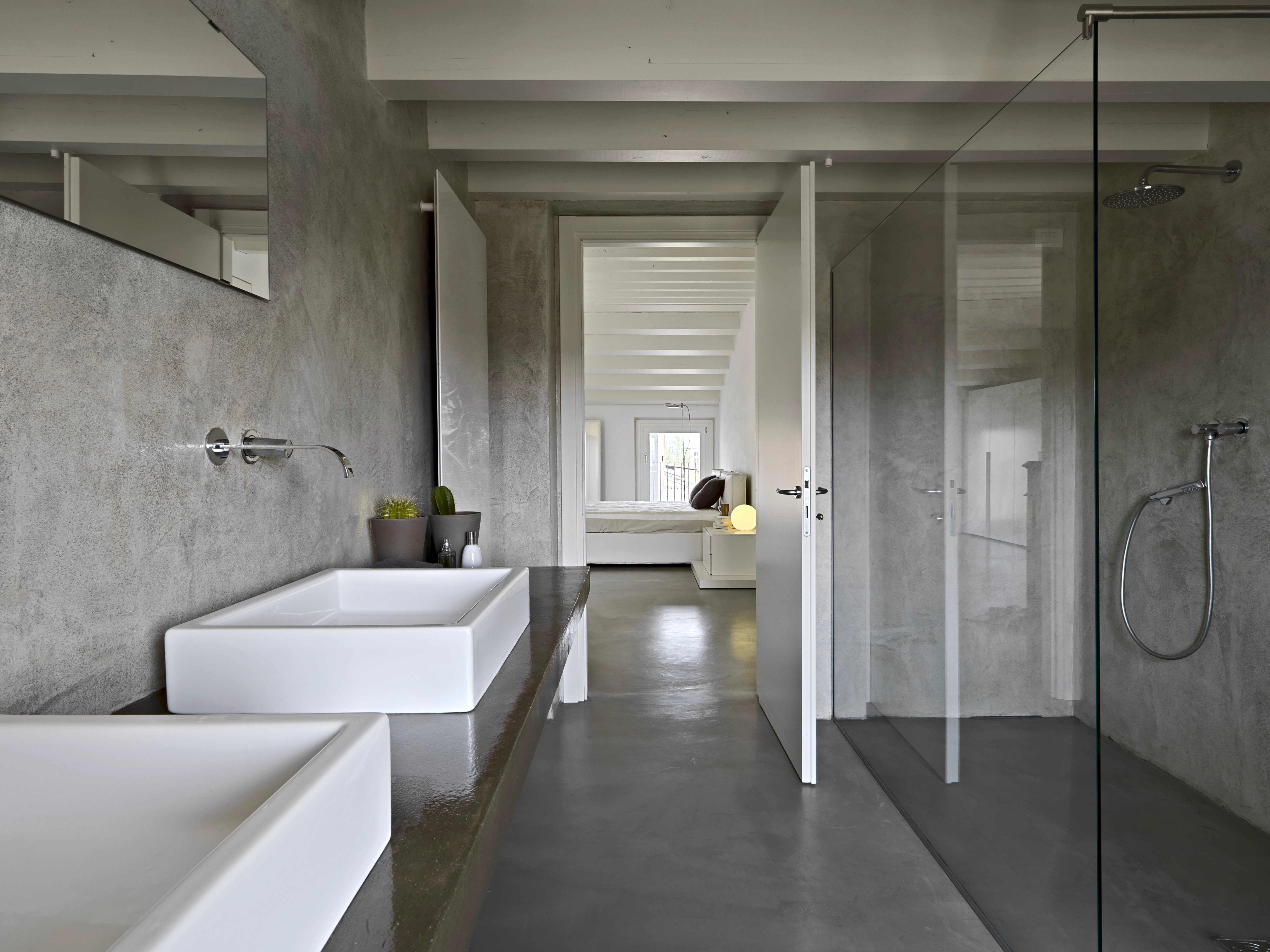 Microcement floor and walls — seamless concrete finish Vancouver bathroom