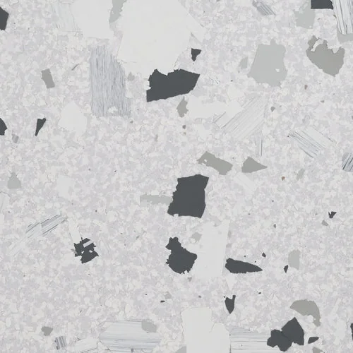 Snowdrift terrazzo epoxy flooring Vancouver — white base with large dark grey and black chips